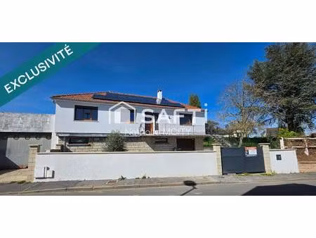 pavillon de plain pied élevé sur sous sol avec garage et dépendance  dpe c.