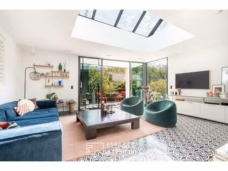 meulière avec extension contemporaine et jardin