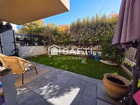 appartement de 3 pièces avec jardin et 2 places de parking