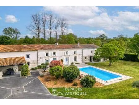 vente maison piscine à benet (85490) : à vendre piscine / 235m² benet