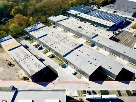 nb kmo-unit (202.46m²) te koop met 2 private parkeerplaatsen voor de deur  elektrische sec