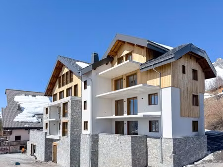 2 à 4 chambres  appartements sud-facing à seulement 90 m des pistes de ski - livraison...
