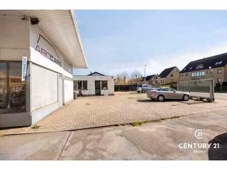 terrain de développement polyvalent avec maison et garage