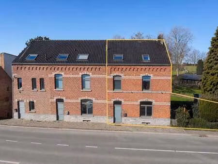 maison 3 façades avec terrasses et grand jardin à leignon !