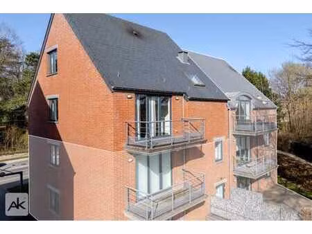 duplex 3 chambres avec balcon et parking intérieur fermé