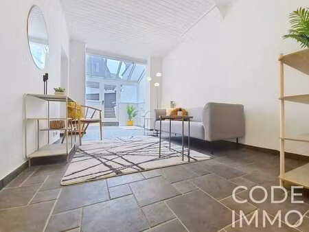 app. 1 ch avec véranda  jardin et espaces polyvalents