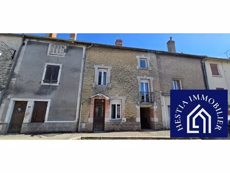 maison de caractère en pierre avec garage