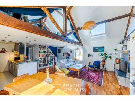 en exclusivité  duplex de charme à mi-chemin entre le centre ville et les bords de seine