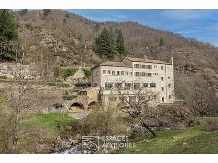 un ancien moulinage aux multiples vies  entre rivière et nature