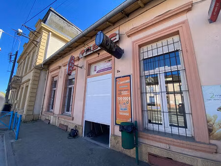 fonde de commerce avec cave et jardin