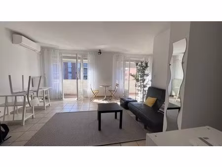 t1 48 m² meublé centre village avec balcon