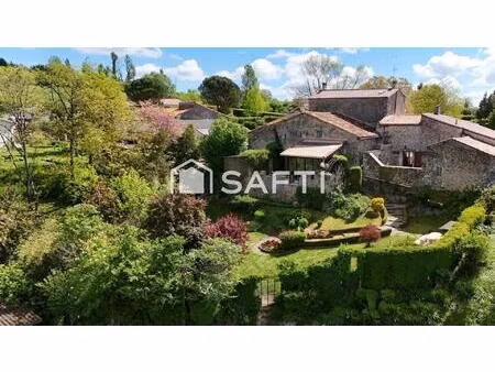maison de hameau de 185 m2 avec 3 chambres un beau jardin et une vue dégagée sur la campag