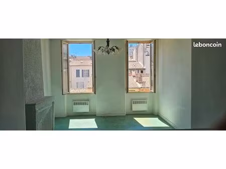 vente appartement de type 2/3 sud / est côté jardins  bd baille13005 marseille