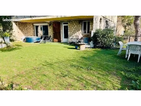 bas de villa avec jardin