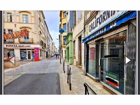 immeuble  fond de commerce / 1 appartement t3