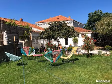 maison centrale de plain pied avec jardin