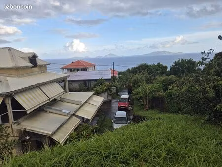 vente 2 appartements + terrain vue les saintes