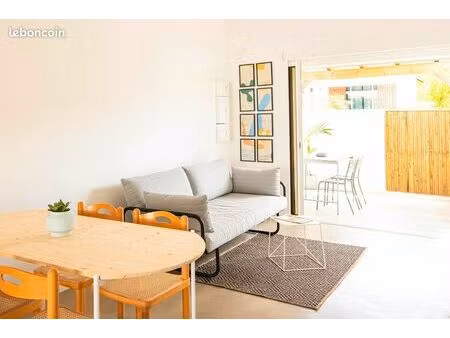 t2 design 50m² — bourg sainte-anne — plage à pied — tout compris