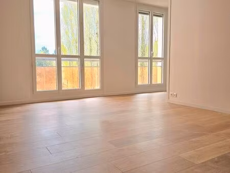 appartement 68.29 m2 renove avec 2 chambres+balcon+garage quartier gare-centre ville