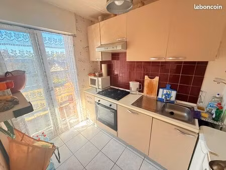 appartement vendu loué – balcon – parking – résidence avec ascenseur