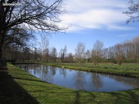 terrain loisirs plan d'eau  chalet  pré   abri animaux  hangar