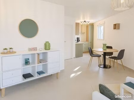 appartement neuf de 3 pièces avec grand jardin  une place de parking