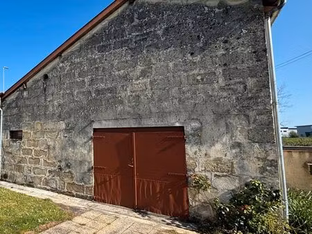 garage 70m2 + bureau 22m2 + 100m2 terrain