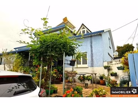 maison d’habitation composée de deux appartements indépendants