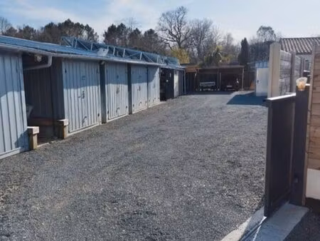 investissement rentable 32 000/an – 26 box loués + maison neuve indépendante