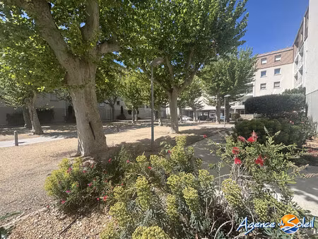 t2 proche quai avec terrasse et parking privatif