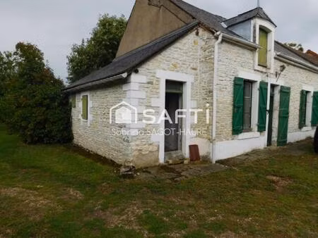 longère sur parc de 2460m2 avec grange et garage