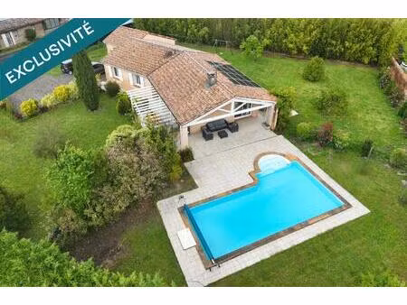 maison d’exception avec piscine et jardin paysager