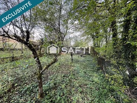 à vendre à cantebonne   terrain d'une superficie de 11 ares + maison 95 m2 avec garages