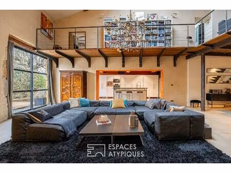 ancienne grange avec terrasse aux volumes exceptionnels