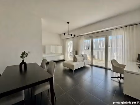 grand appartement t4 de 89m2 et garage  bien situé