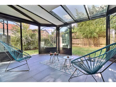 appartement avec jardin 4 pièce(s) 132 m2 carrez+ véranda de 19m² + deux places de parking