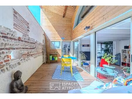 ancien atelier réhabilité en maison de ville avec patio