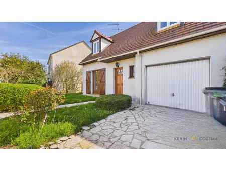 maison 6 pièces de 110m2 - centre-ville ballainvilliers