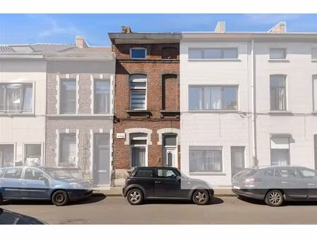 woning met 4 slaapkamers en buitenruimte in gent centrum.