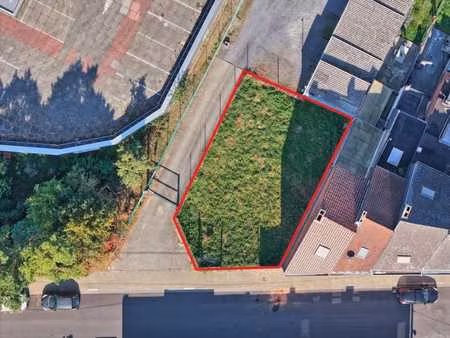 terrain à bâtir + permis pour 2 habitations