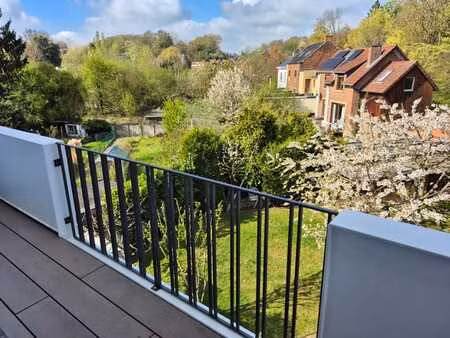 lumineux appartement 2 chambres avec 2 caves et garage