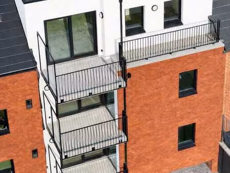 appartement 2ch  herve  balcon  briques rouges  classe a