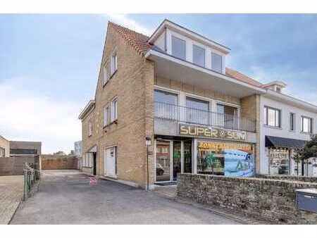 handelspand met ruime duplexwoning en 3 garages te brugge