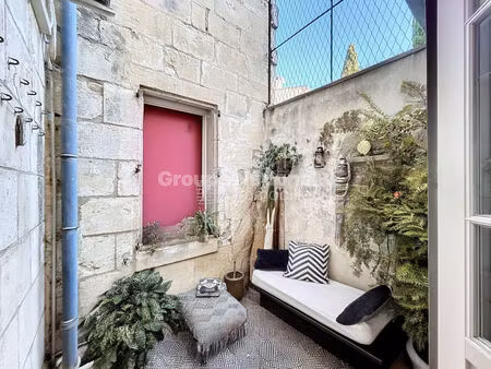 appartement 3 pièce(s)  86 m2  2 chambres sdb cour de 5 m2