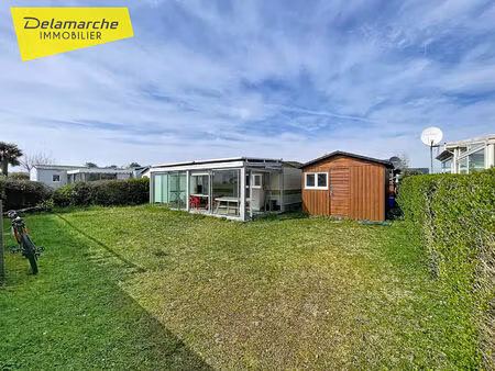 mobile home avec véranda et cabanon dans un prl avec piscine