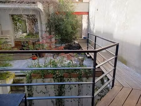 duplex avec cour et jardin dans habitat groupé