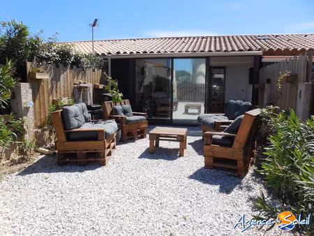 pavillon t2 mezzanine avec véranda et jardin