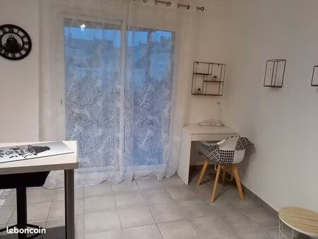 grand t1 avec terrasse et garage individuel proche commerces et transports