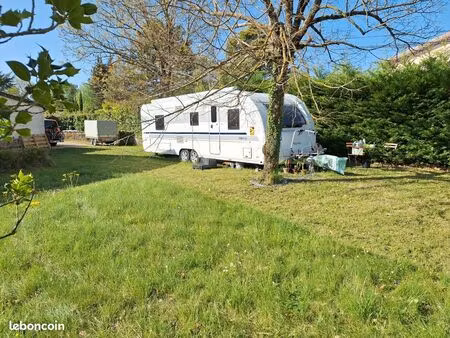 cherche bout de terrain / jardin pour caravane