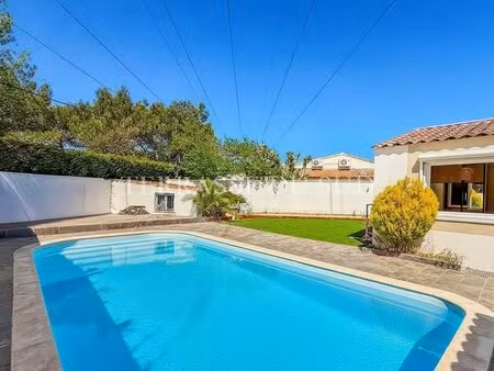 vente maison plain pied  5 pièces de 107 m2 avec terrasses  jardin et piscine sur parcelle